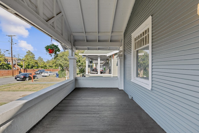 wooden deck with a porch