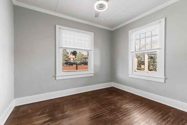 unfurnished room with ceiling fan, a healthy amount of sunlight, ornamental molding, and dark hardwood / wood-style floors