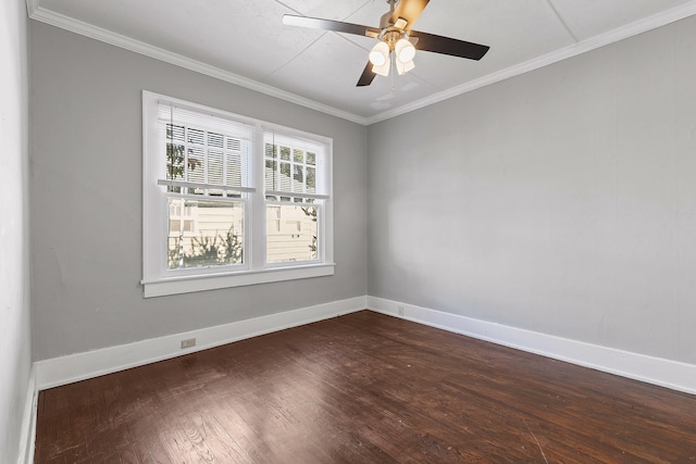 spare room with crown molding, ceiling fan, and dark hardwood / wood-style flooring