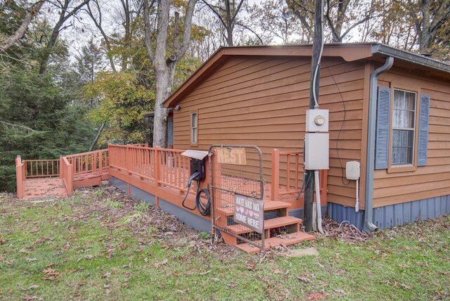 134 Old Spring Rd, Rising Fawn, GA 30738 - view of side of property with a wooden deck and a lawn