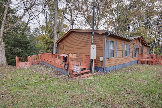 134 Old Spring Rd, Rising Fawn, GA 30738 - view of property exterior with a deck and a yard