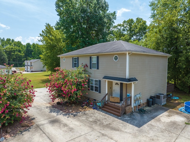 view of front of house featuring central AC