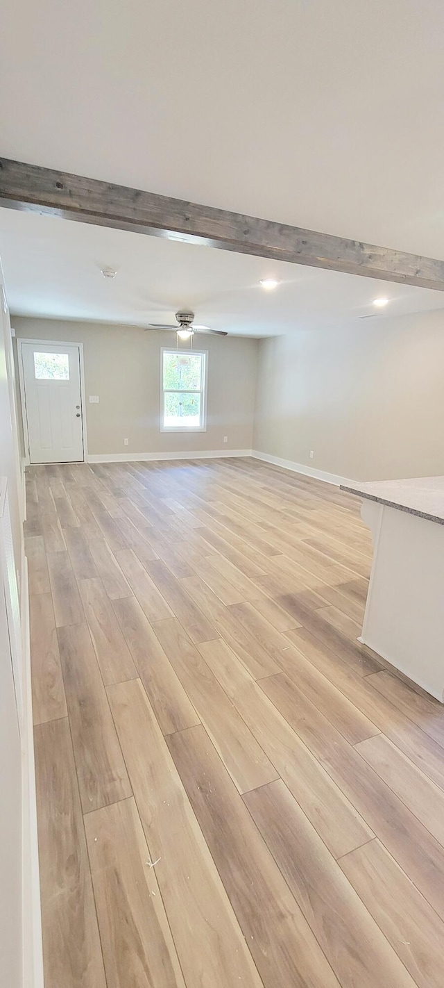 basement featuring light wood-type flooring