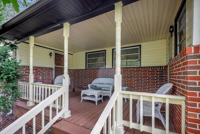 deck featuring covered porch