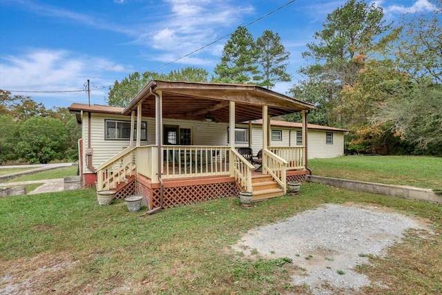 view of front of home with a front lawn