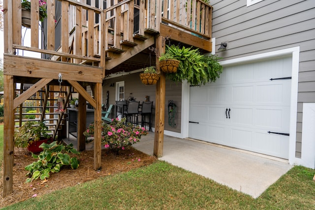 exterior space with a garage and a patio