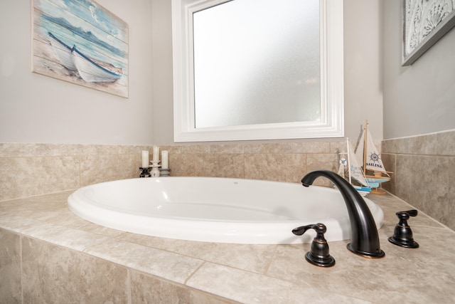 bathroom with a garden tub