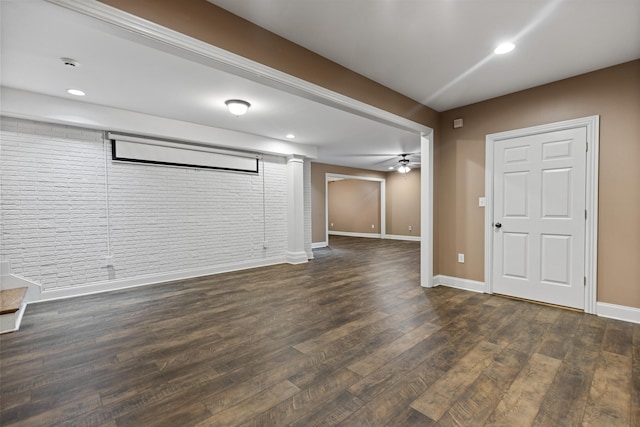 interior space featuring ceiling fan and dark hardwood / wood-style floors