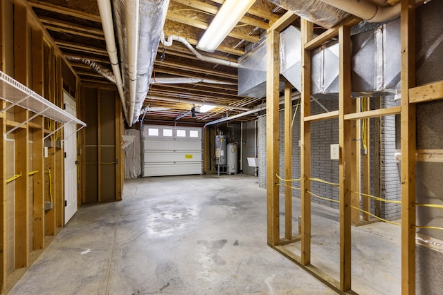 garage with water heater and gas water heater