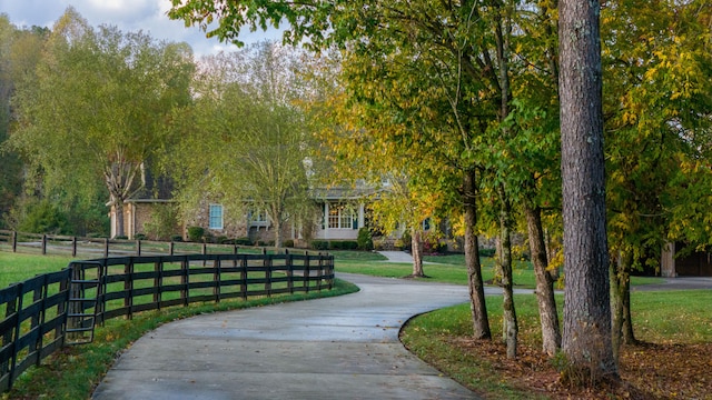 surrounding community featuring a yard