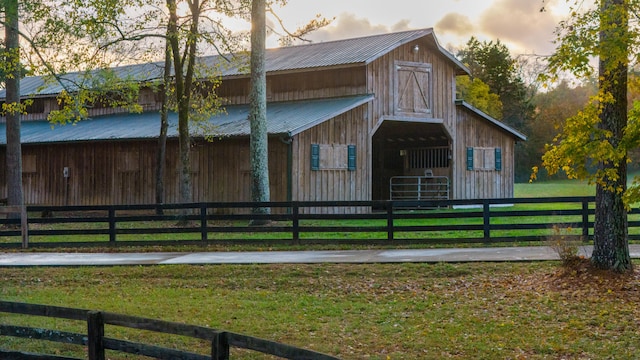 view of front facade with an outbuilding