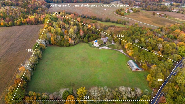 birds eye view of property featuring a rural view