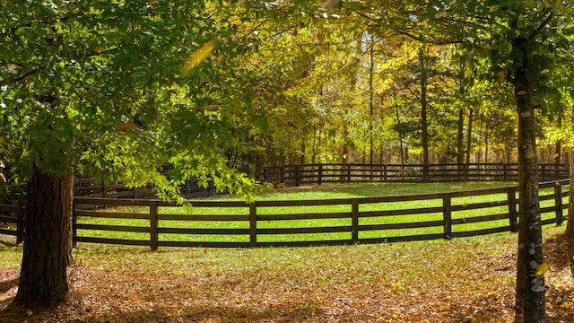 view of gate featuring a lawn