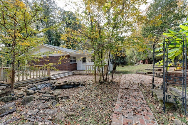 view of yard with a deck