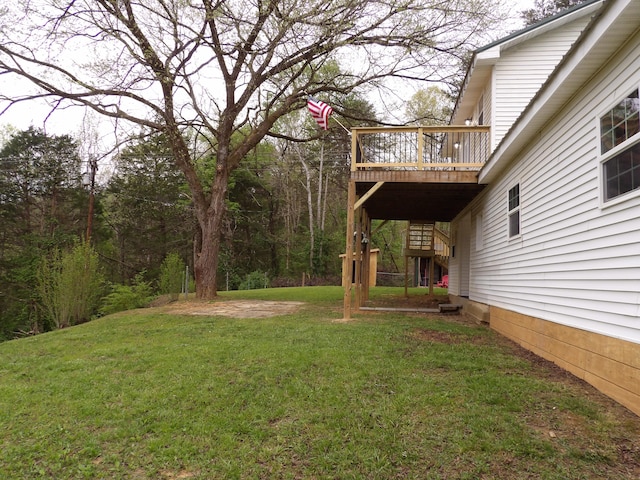 view of yard featuring a wooden deck