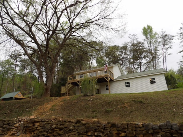 rear view of house with a deck