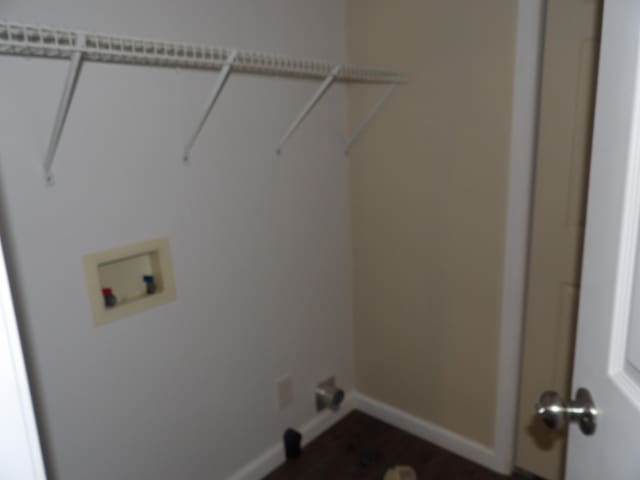 clothes washing area featuring washer hookup