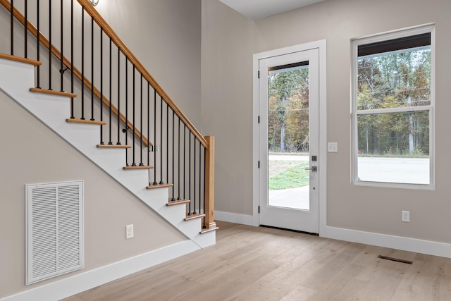 foyer entrance featuring light hardwood / wood-style floors