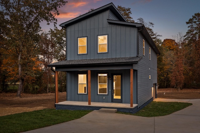 view of front of property featuring covered porch