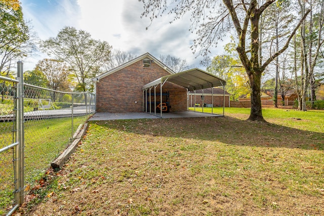 exterior space with a carport