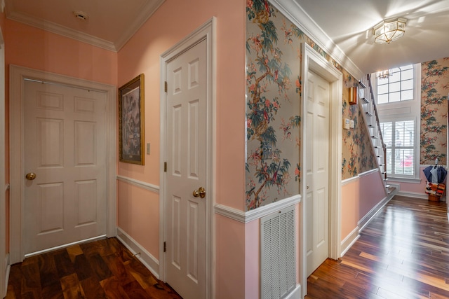 hall featuring dark hardwood / wood-style flooring and ornamental molding