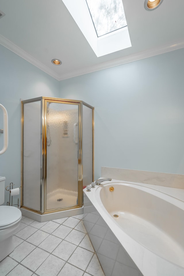 bathroom with ornamental molding, tile patterned floors, and a skylight