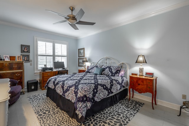 bedroom featuring ceiling fan, light wood-type flooring, and ornamental molding