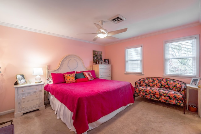 bedroom featuring ornamental molding, light colored carpet, and ceiling fan