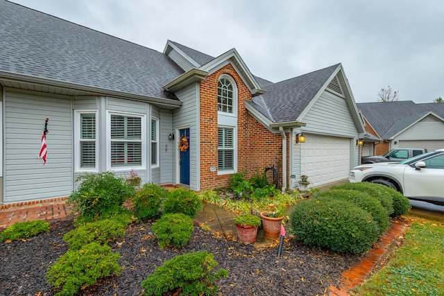 view of front of property featuring a garage