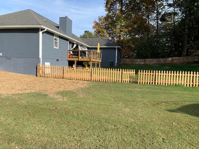 view of yard with a deck