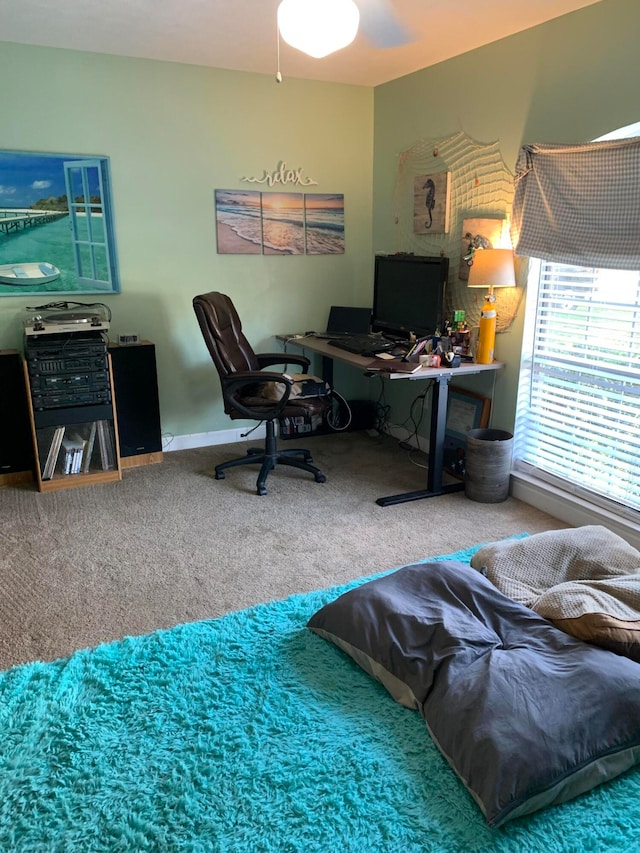 office area featuring carpet flooring and ceiling fan