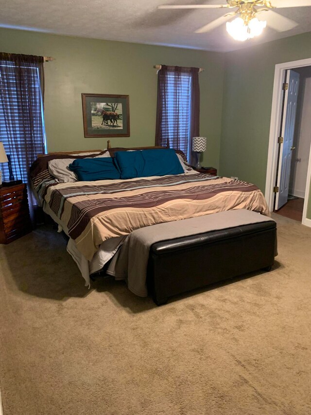 bedroom featuring carpet flooring and ceiling fan