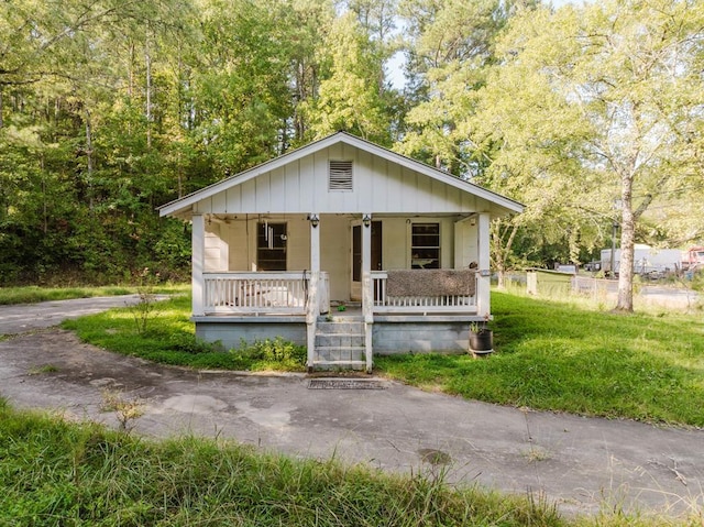 bungalow-style home with a porch