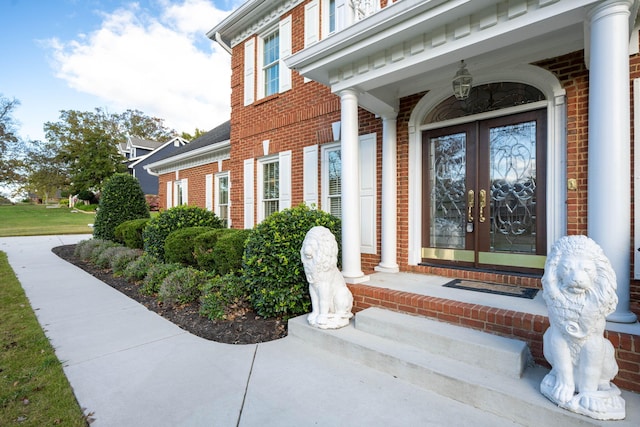 property entrance featuring french doors