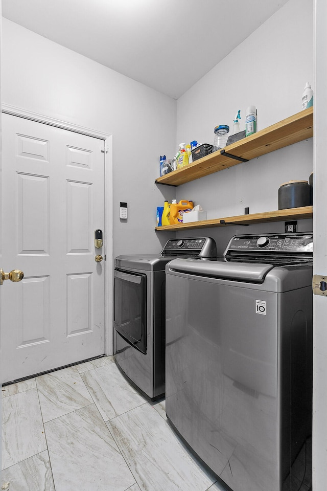 washroom featuring independent washer and dryer