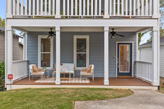 property entrance with ceiling fan and a balcony