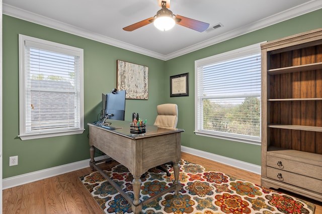 office space with crown molding, hardwood / wood-style flooring, and ceiling fan