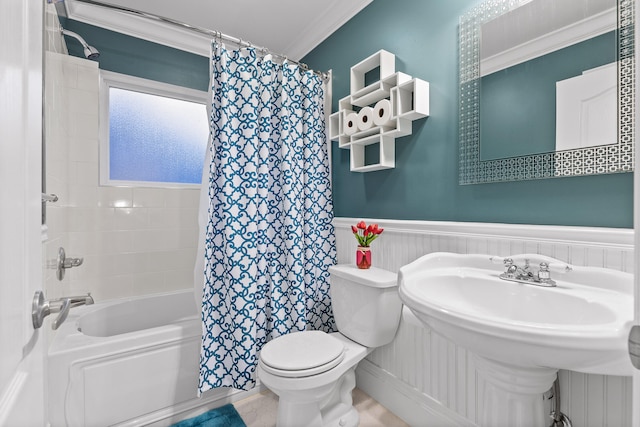 bathroom with toilet, ornamental molding, and shower / bathtub combination with curtain