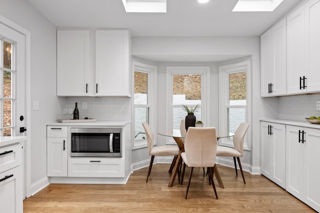 dining room featuring light hardwood / wood-style flooring