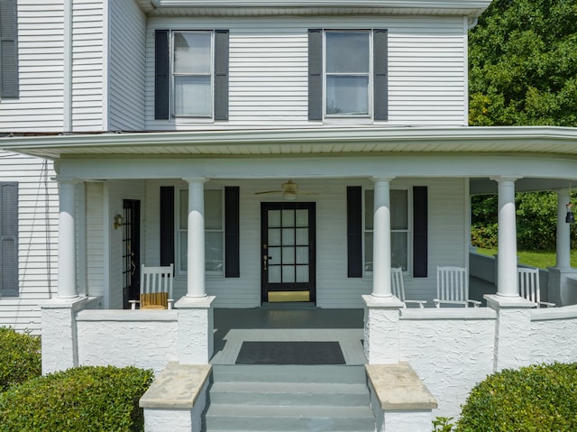 doorway to property with a porch