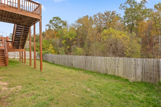 view of yard featuring a wooden deck