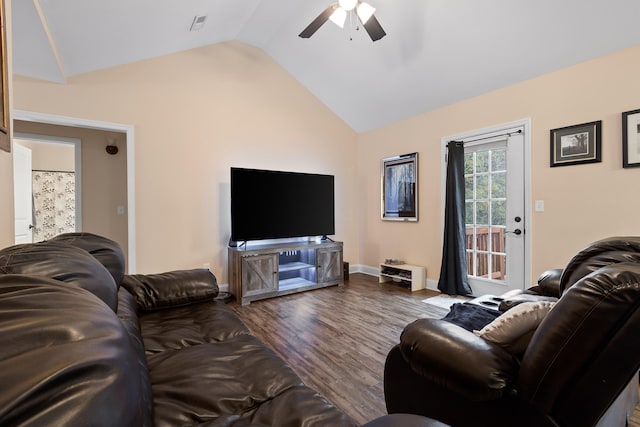 living room featuring hardwood / wood-style floors, lofted ceiling, and ceiling fan