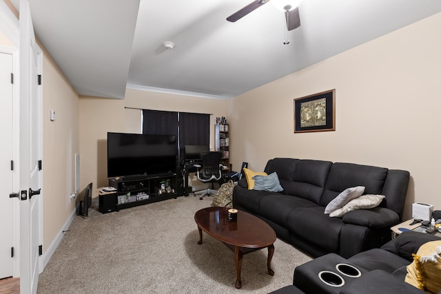 living room featuring ceiling fan and carpet flooring