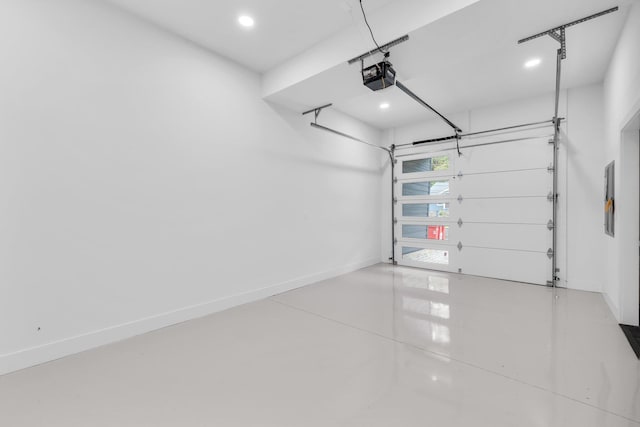 garage featuring a garage door opener and electric panel