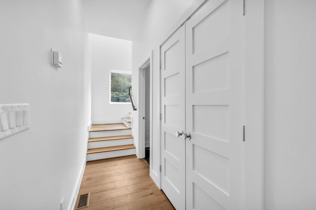 hall featuring light hardwood / wood-style flooring