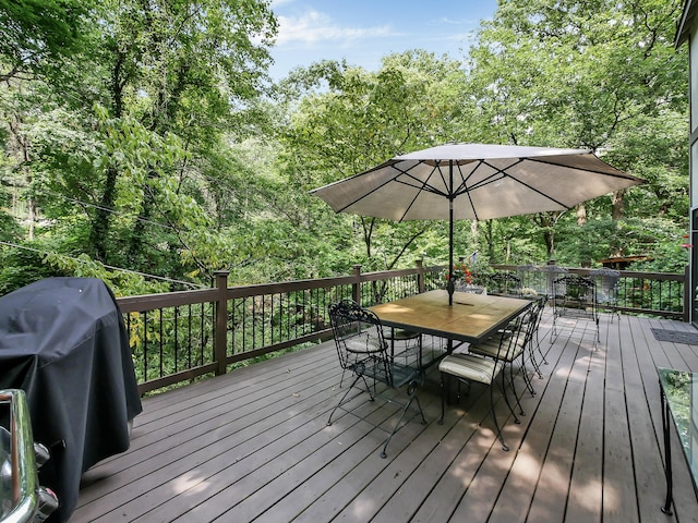 wooden deck with area for grilling