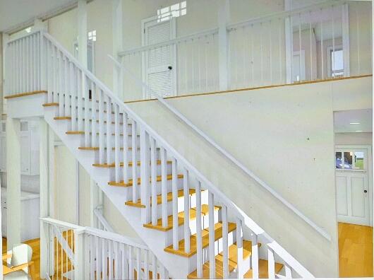 stairway featuring hardwood / wood-style floors