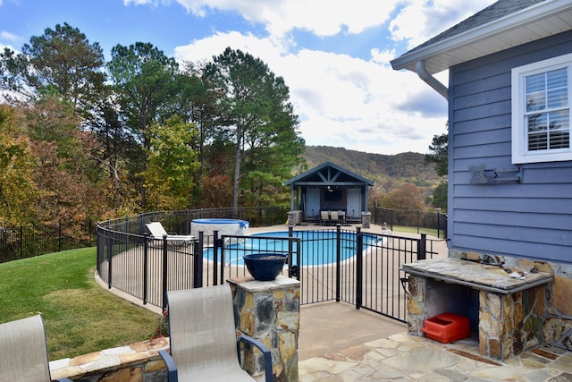 334 Belaire Dr, Copperhill, TN 37317 - view of pool featuring a hot tub and a patio area