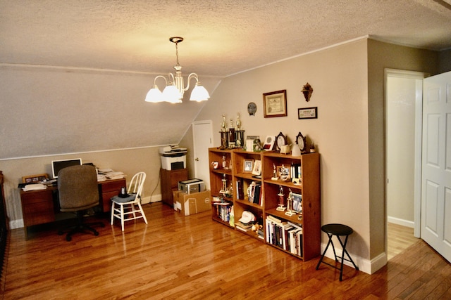 334 Belaire Dr, Copperhill, TN 37317 - office area with wood finished floors, a textured ceiling, baseboards, vaulted ceiling, and a chandelier