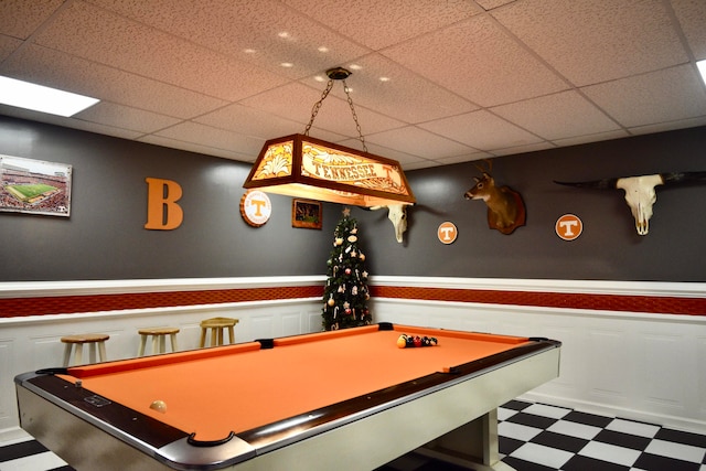 playroom with a paneled ceiling and pool table